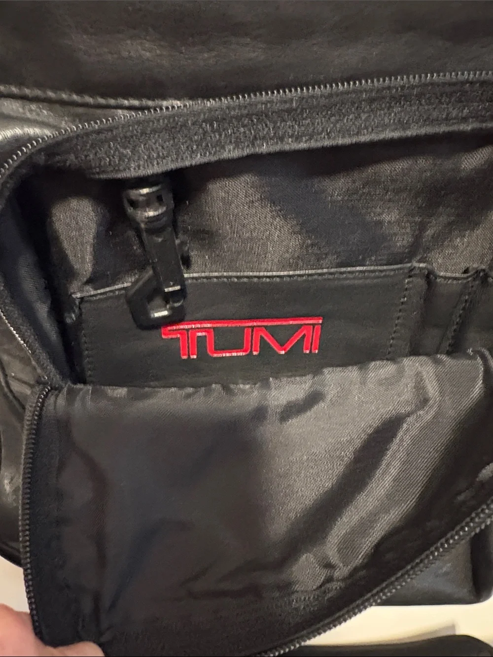 Tumi Black Laptop Backpack with Red Logo Accent